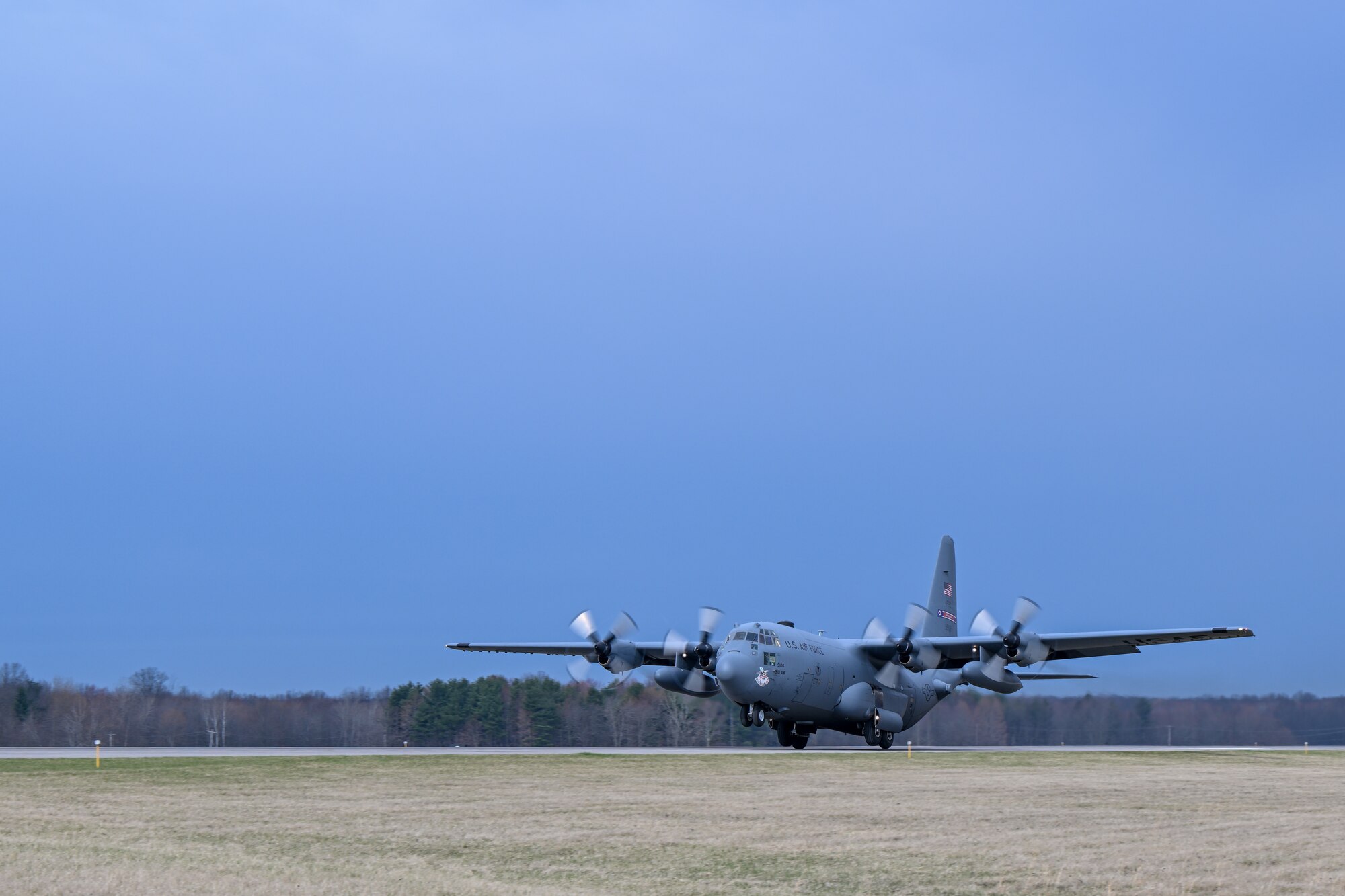 A C-130H Hercules aircraft assigned to the 910th Airlift Wing takes off from Youngstown Air Reserve Station, Ohio, for a local training flight, March 14, 2024.