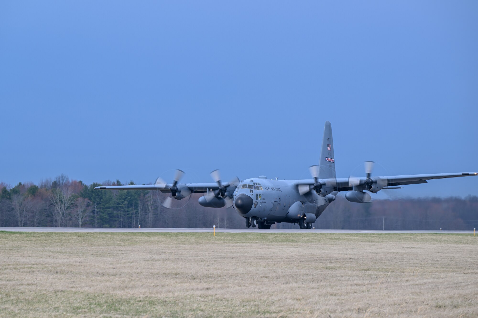 A C-130H Hercules aircraft assigned to the 910th Airlift Wing takes off from Youngstown Air Reserve Station, Ohio, for a local training flight, March 14, 2024.