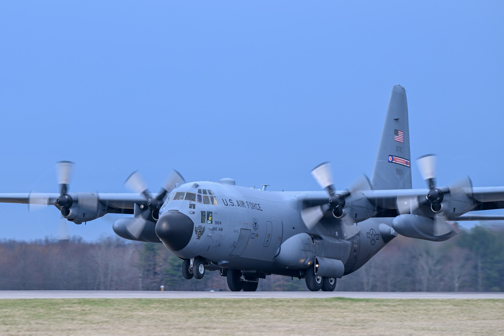 A C-130H Hercules aircraft assigned to the 910th Airlift Wing takes off from Youngstown Air Reserve Station, Ohio, for a local training flight, March 14, 2024.