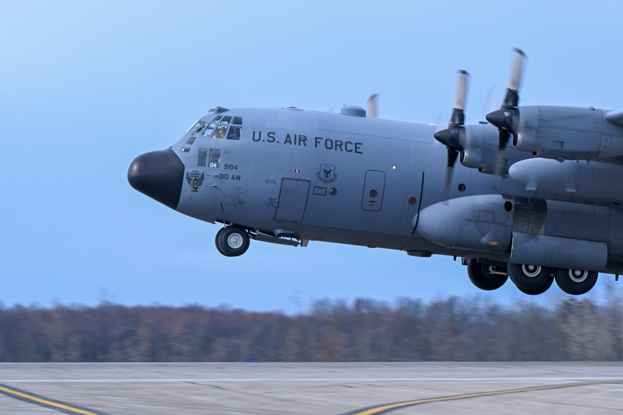 A C-130H Hercules aircraft assigned to the 910th Airlift Wing takes off from Youngstown Air Reserve Station, Ohio, for a local training flight, March 14, 2024.