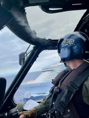 A Coast Guard MH-60T Jayhawk helicopter conducts the medevac of 57-year-old man, U.S. citizen, Symphony of the Seas cruise ship passenger in waters just southwest of Cabo Rojo, Puerto Rico, March 14, 2024.  The man was transported to a local hospital to receive a higher level of care.  (U.S. Coast Guard photo.)