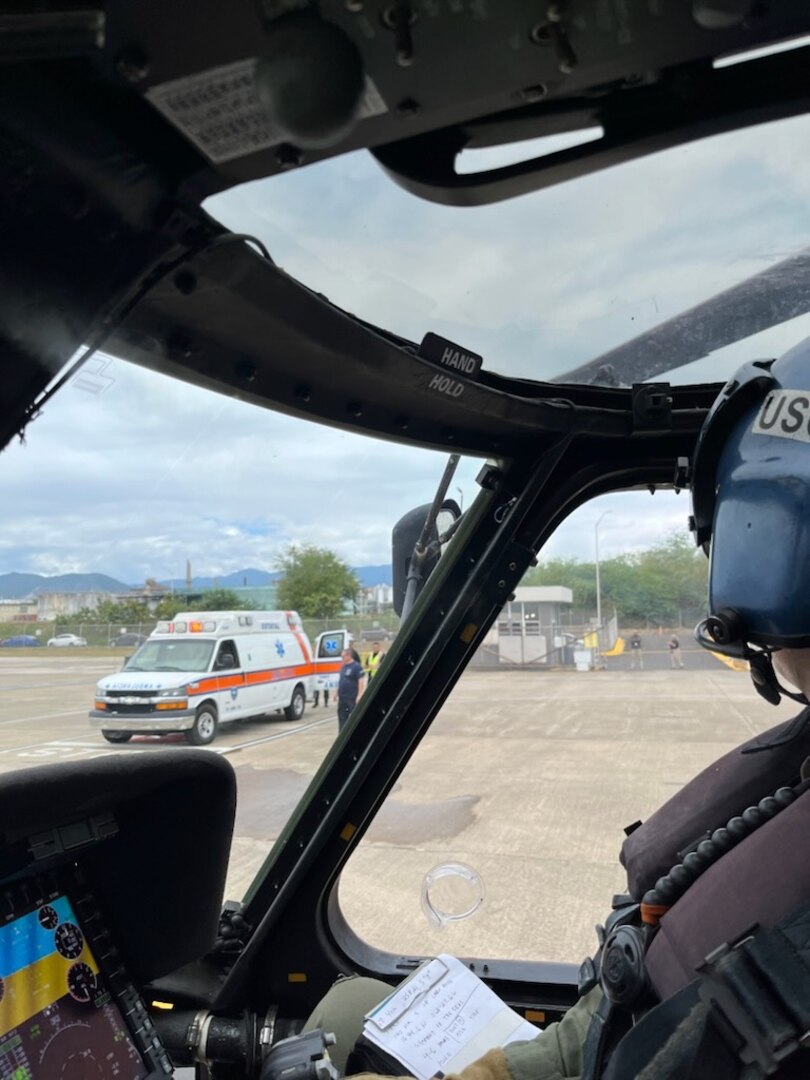 A Coast Guard MH-60T Jayhawk helicopter aircrew transfers a 57-year-old man, U.S. citizen, passenger, who was medevacked from the Symphony of the Seas cruise ship in waters just southwest of Cabo Rojo, Puerto Rico, March 14, 2024.  The man was transported to a local hospital to receive a higher level of care.  U.S. Coast Guard photo.