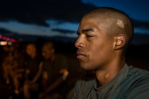U.S. Marine Corps Recruit Conner Kendrick, with Golf Company, 2nd Recruit Training Battalion, awaits instruction after the plank portion of the Marine Corps Physical Fitness Test at Marine Corps Recruit Depot San Diego, California, March 11, 2024. The PFT is conducted during recruit training as an evaluation of stamina and physical conditioning. (U.S. Marine Corps photo by Sgt. Yvonna Guyette)