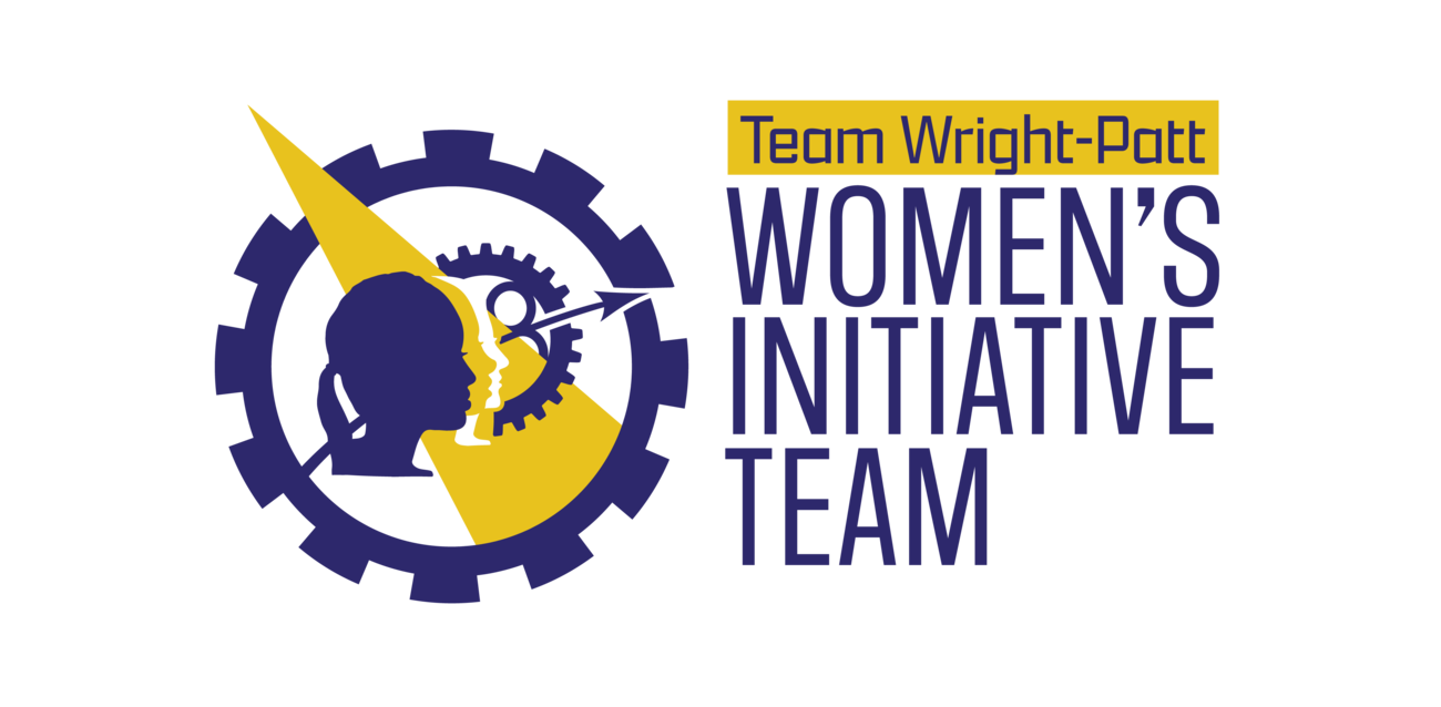Illustration of a silhouette female head in the middle of a large gear emblem and a smaller gear emblem with an arrow pointing forward. To the right of the illustration it reads Team Wright-Patt Women's Initiative Team. Primary colors are yellow and a dark blue.