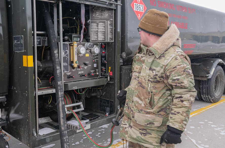Senior Airman Tristan Turkovitz, 5th Logistic Readiness Squadron fuels equipment maintenance technician, monitors a control panel while refueling a UH-1N Iroquois at Minot Air Force Base, North Dakota, March 7, 2024. Turkovitz ensured the fuels distribution equipment was functioning properly throughout the refueling process. (U.S. Air Force photo by Airman 1st Class Kyle Wilson)