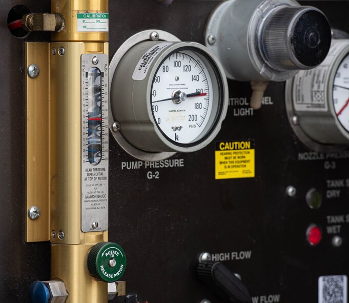 A fuels control panel is displayed on an R-11 fuel truck at Minot Air Force Base, North Dakota, March 7, 2024. The gauges indicate to equipment operators the fuels distribution equipment is functioning correctly and safely. (U.S. Air Force photo by Airman 1st Class Kyle Wilson)