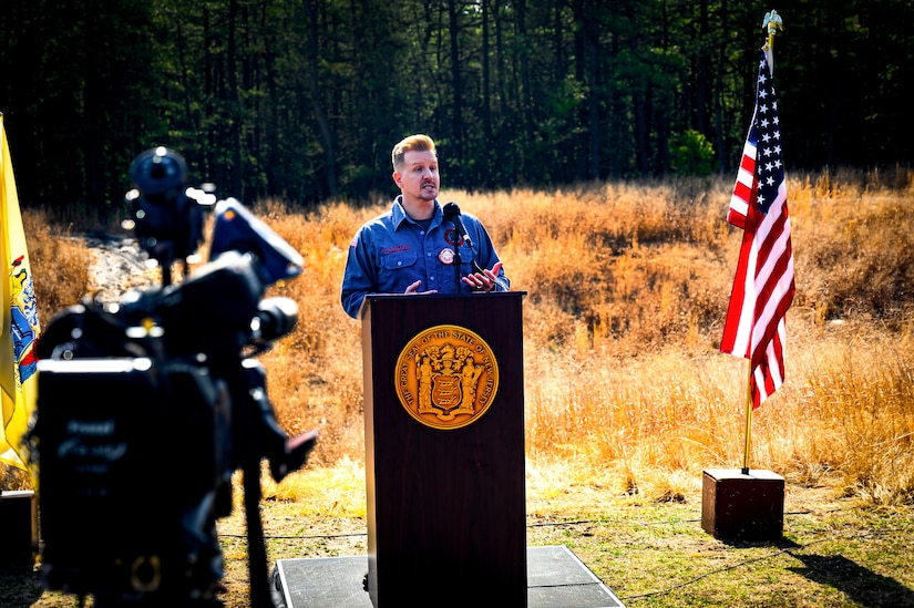 Shawn LaTourette, New Jersey Department of Environmental Protection commissioner, gives opening remarks during a firebreak demonstration in Manchester Township, N.J., March 13, 2024. Officials toured a strategic forest fuel break in Manchester Township, Ocean County, one of three wildfire resilience projects in the Pinelands funded through the U.S. Department of Defense’s Readiness and Environmental Protection Integration Challenge Program. REPI facilitates long-term partnerships to improve resilience to climate change, preserve wildlife habitats and natural resources, and promote sustainable land uses near military installations and ranges. (U.S. Air Force photo by Senior Airman Matt Porter)