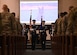 Members of the Joint Base Andrews honor guard present colors during the national anthem for a military working dog memorial service at Joint Base Andrews, Md., March 11, 2024. The 316th Security Support Squadron, joined by base leadership and community members honored the life and service of Military Working Dog Crock, who passed on March 4th after five years of honorable service to the U.S. Air Force. (U.S. Air Force photo by Senior Airman Austin Pate)