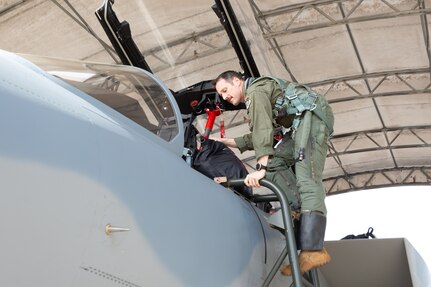 Lt. Col. Joel Thesing, 123rd Fighter Squadron pilot, climbs into an F-15 EX at Eglin Air Force Base, Fla., March 7, 2024. Thesing is the first Portland, Ore.-based pilot to fly and train in the EX.