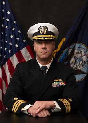 Official studio image of Cmdr. Ben Coyle, Executive Officer, USS HERSHEL "WOODY" WILLIAMS (ESB 4) Gold Crew