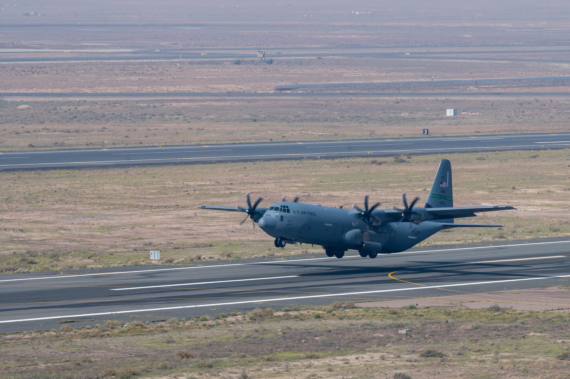 A C-130J loaded with humanitarian aid destined for Gaza via airdrop takes off.