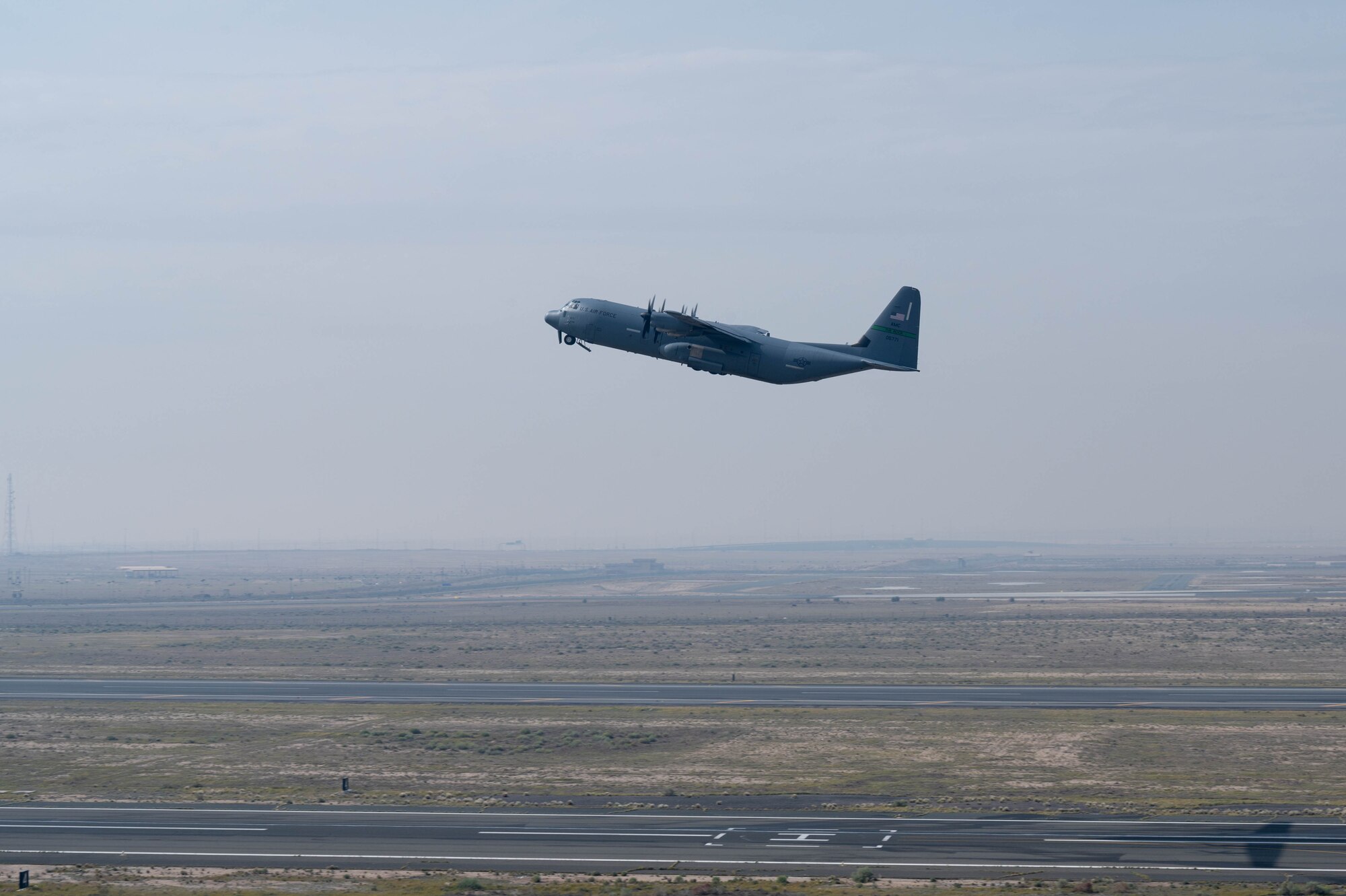 A C-130J loaded with humanitarian aid destined for Gaza via airdrop takes off.