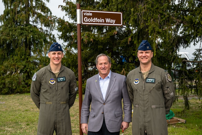 Retired Gen. David L. Goldfein, 21st Chief of Staff of the Air Force, alongside Col. Beau Diers, 31st Fighter Wing deputy commander, and Lt. Col. Rolf Tellefsen, 555th Fighter Squadron commander, pose for a photo.