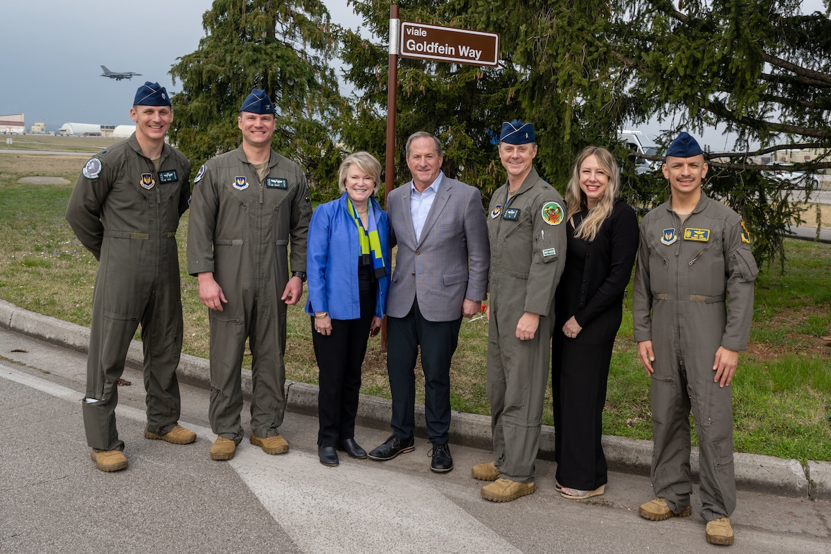 Retired Gen. David L. Goldfein, 21st Chief of Staff of the Air Force, alongside 31st Fighter Wing leadership and their spouses.