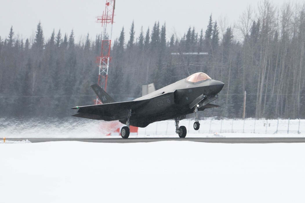 An F-35A Lightning II begins to lift off from the flightline as it takes off for a routine training at Eielson Air Force Base, Alaska, March 14, 2024.