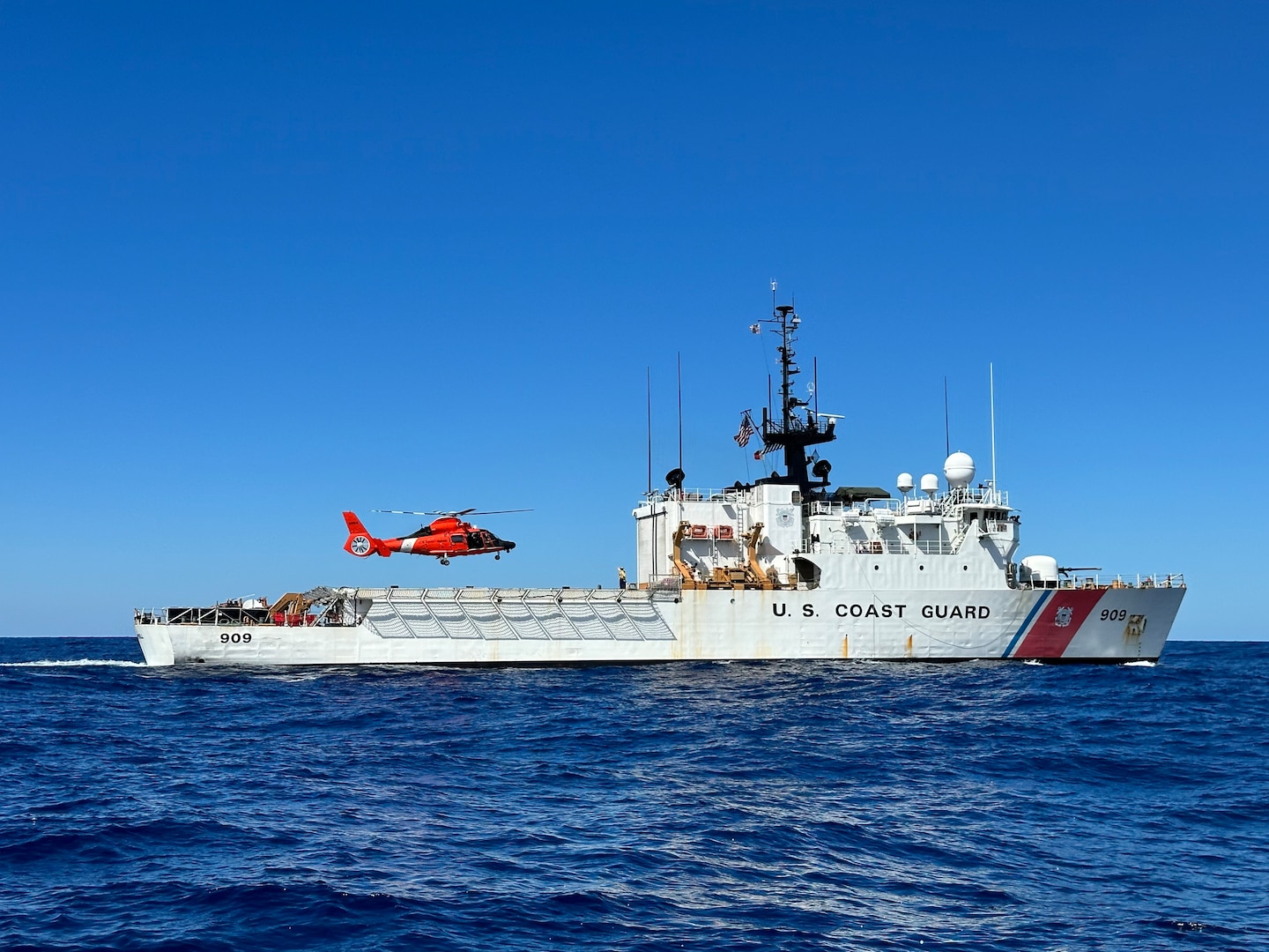 A U.S. Coast Guard MH-65 Dolphin helicopter crew lands on the flight deck of the Coast Guard Cutter Campbell (WMEC 909), Feb. 8, in the North Pacific Ocean. Campbell is a 270-foot, Famous-class medium endurance cutter. The cutter's primary missions are counter-narcotics, migrant interdiction, living marine resources protection, and search and rescue in support of U.S. Coast Guard operations throughout the Western Hemisphere.