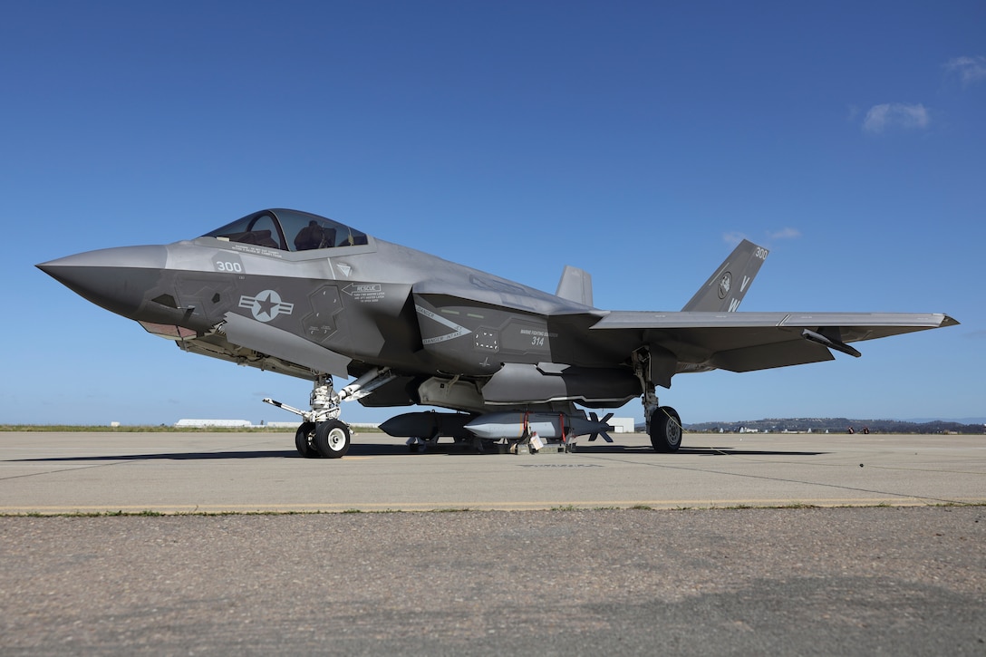 A U.S. Marine Corps F-35C Lightning II assigned to Marine Fighter Attack Squadron (VMFA) 314, Marine Aircraft Group 11, 3rd Marine Aircraft Wing, and two AGM-154 Joint Standoff Weapon (JSOW) are staged at Marine Corps Air Station Miramar, California, March 8, 2024. The JSOW is a fire-and-forget medium-range precision guided weapon intended for use against soft targets. This loading of the JSOW is the first loading of the weapon system on the F-35C and the first time being loaded in a garrison environment in nearly 20 years.