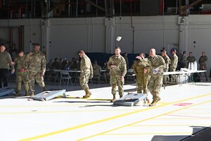 Airmen playing cornhole