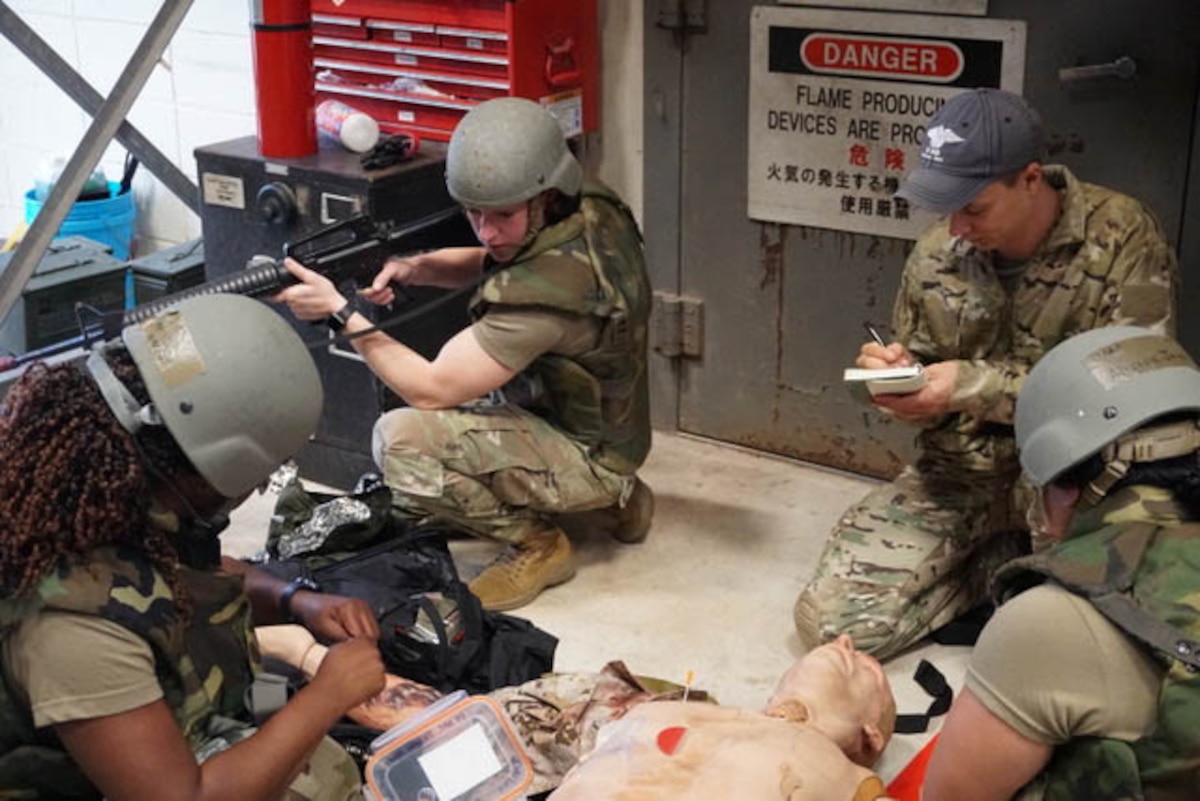 Airmen operate on a maniquine