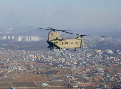 A Republic of Korea Army CH-47F Chinook helicopter, 2nd Division/ROK-U.S. Combined Division, performs a sling load of a 12,000-pound High Mobility Multi-Wheeled Vehicle (HMMWV) while conducting combined air assault and ground training exercises during Freedom Shield 24, March 13, 2024, at the Korea Combined Training Center, South Korea. FS24, a holistic military training program, integrates ground, air, and naval elements, enhancing readiness through realistic combat simulations, interoperability, and live exercises refining troops’ combat skills. (U.S. Army photo by KPfc. Lee, Hyun Bin)