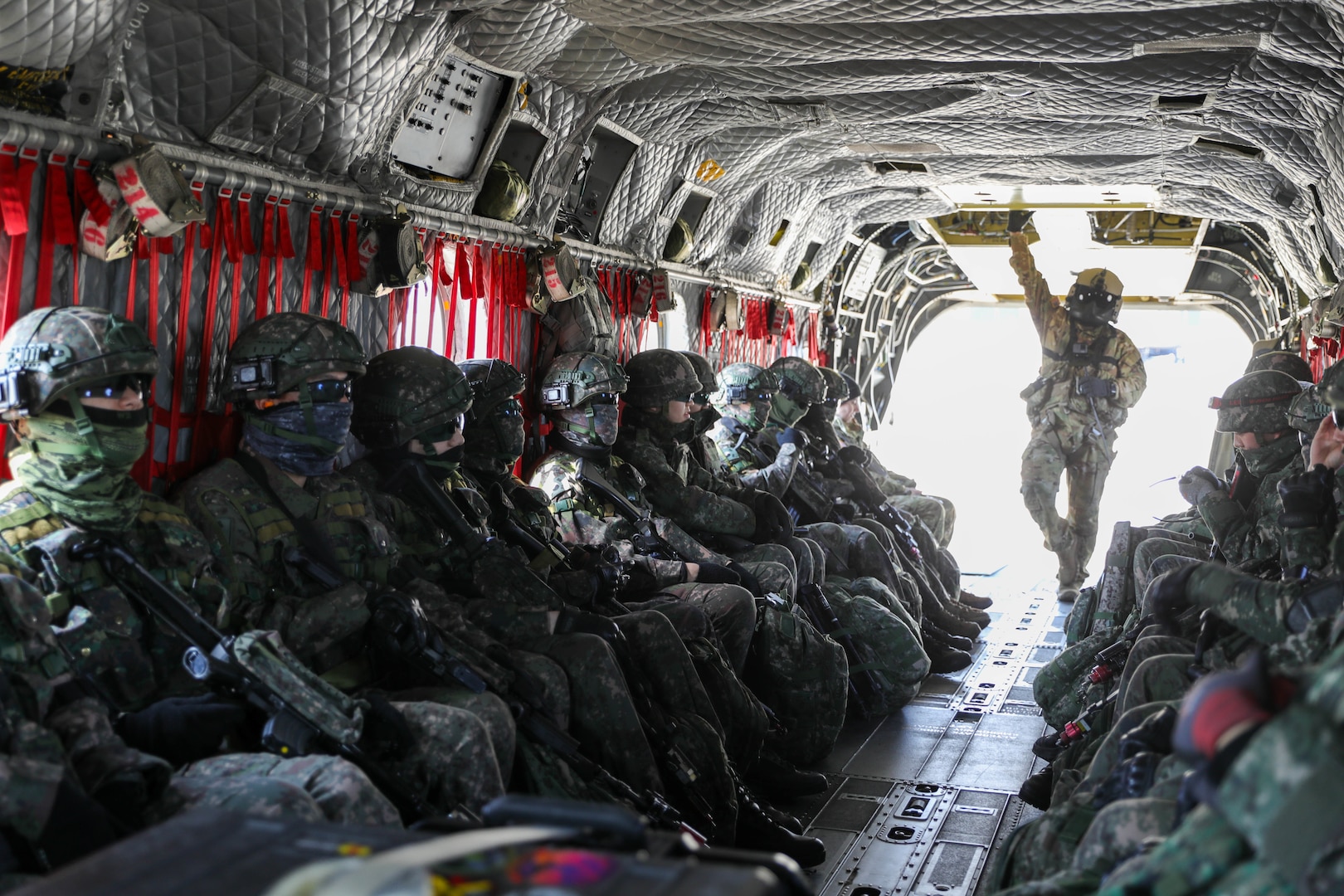 U.S. Army Ch-47F Chinook helicopters, 2nd Division/ROK-U.S. Combined Division, deliver troops to a training area while conducting combined air and ground assault training exercises during Freedom Shield 24, March 13, 2024, at the Korea Combined Training Center in South Korea. An annual event, FS24, a holistic military training program, integrates ground, air, and naval elements, enhancing readiness through realistic combat simulations, interoperability, and live exercises refining troops’ combat skills.