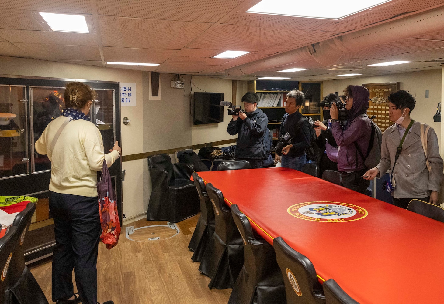 ISHIGAKI, Japan (Mar. 11, 2024) Local media tour the wardroom of the Arleigh Burke-class guided-missile destroyer USS Rafael Peralta (DDG 115) in Ishigaki, Japan during a regularly scheduled port visit. Rafael Peralta is the first United States destroyer to visit Ishigaki. Rafael Peralta is forward-deployed and assigned to Destroyer Squadron (DESRON) 15, the Navy’s largest DESRON and the U.S. 7th Fleet’s principal surface force. (U.S. Navy photo by Mass Communication Specialist 1st Class Devin Monroe)