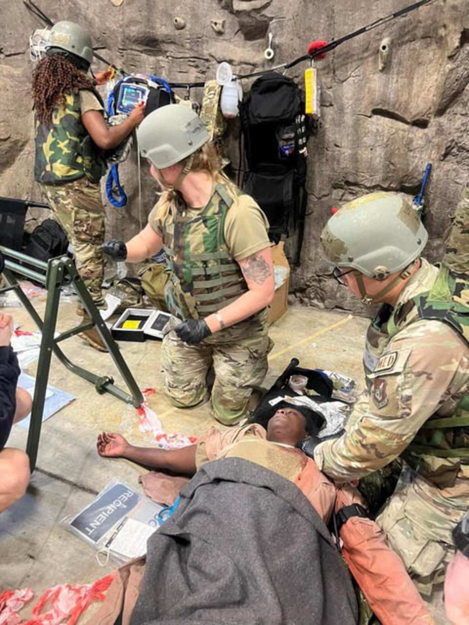 Airmen operate on a maniquen