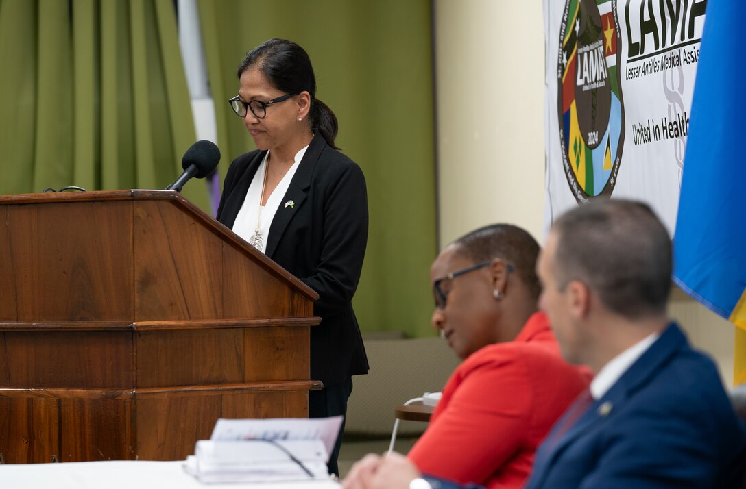 U.S. Air Force Lt. Col. Jessica Arcilla, 349th Medical Squadron medical commander and LAMAT troop commander, delivers remarks at the Financial Complex, Kingstown, during the Lesser Antilles Medical Assistance Team closing ceremony in St. Vincent and the Grenadines, March 12, 2024. Thirty-four active duty and reserve Airmen participated in this year’s LAMAT mission to St. Vincent and the Grenadines, assisting in health engagements, exchanging best practices and developing stronger relationships with host nation partners. (U.S. Air Force photo by Capt. Danny Rangel)