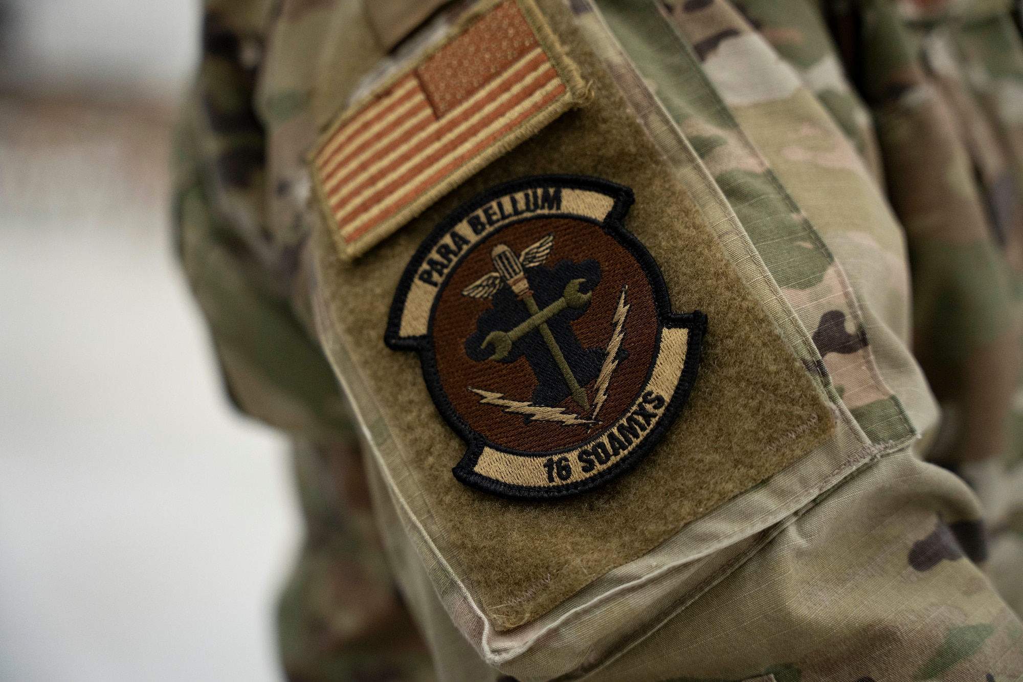 A member of the 16th Special Operations Aircraft Maintenance Squadron stands in formation during the 27th Special Operations Aircraft Maintenance Squadron redesignation ceremony at Cannon Air Force Base, N.M., March 15, 2024. The 27th SOAMXS was redesignated to the 16th SOAMXS to better align its identity with its mission: to develop elite maintainers ready to generate safe, reliable aircraft to execute special operations missions. (U.S. Air Force photo by Airman 1st Class Tori Shearn)