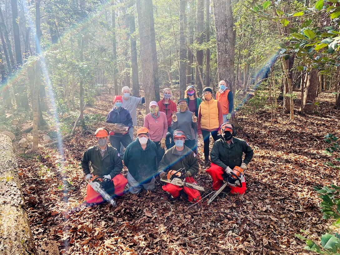 Volunteers with Southern Piedmont Master Naturalist Chapter volunteer at Liberty Hill Nature Trail clearing debris.