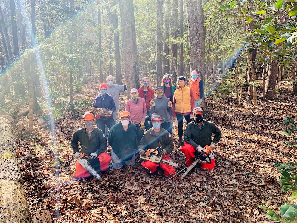 Volunteers with Southern Piedmont Master Naturalist Chapter volunteer at Liberty Hill Nature Trail clearing debris.