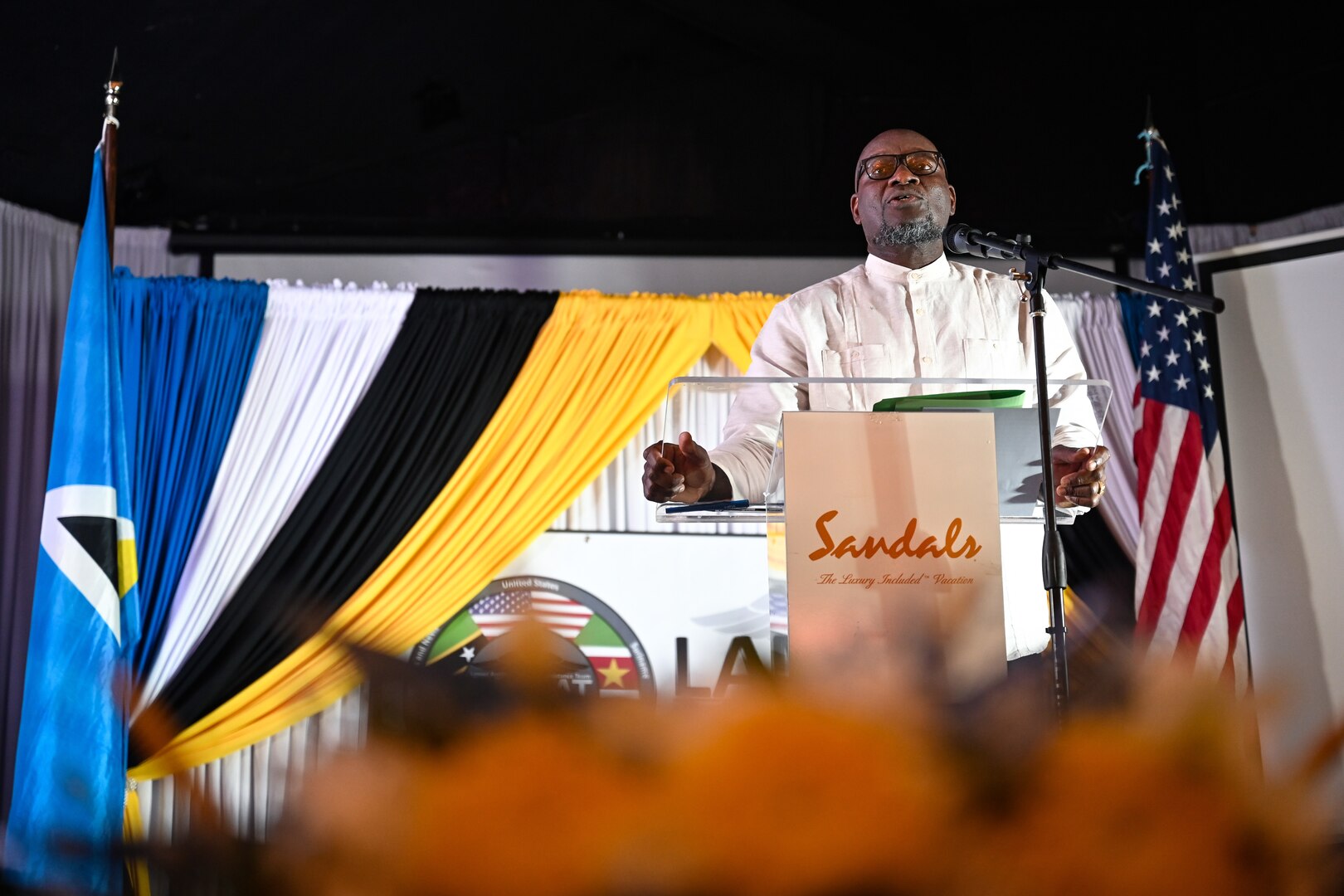 The Honorable Moses Jn. Baptiste, Minister of Health, gives remarks during the closing ceremony for the Lesser Antilles Medical Assistance Team mission in Castries, St. Lucia, March 6, 2024. The team successfully performed 50 surgeries while providing valuable best practices to host nation medical personnel, enabling local facilities to build greater vascular surgery capacity for local patients. (U.S. Air Force photo by Staff Sgt. Madeline Herzog)