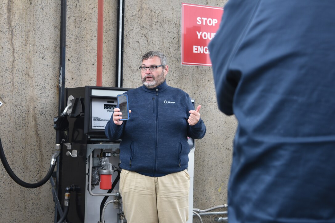 Tim Throckmorton, a Gasboy field engineer, explains how the new system works compared to the previous payment system during a training session at Combined Arms Training Center, Camp Fuji, March 7, 2024. (U.S. Marine Corps photo by Song Jordan)