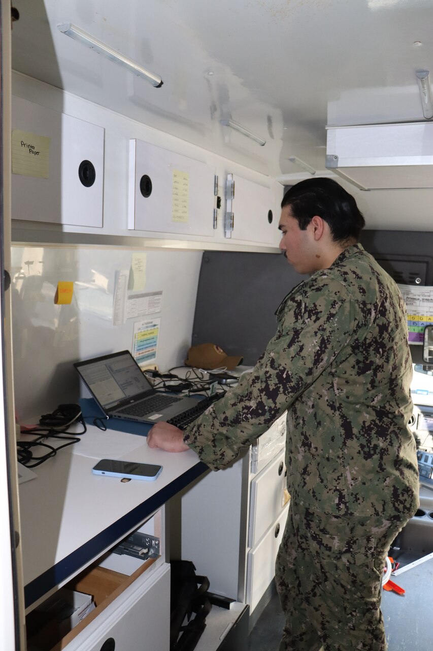 Hospital Corpsman Gabriel Garcia, with the Occupational Audiology and Hearing Conservation Division from Naval Medical Center Portsmouth administers audiology exams. Supervisor of Shipbuilding, Conversion and Repair, USN, Newport News Code 140 Environmental Safety & Health Office, took a big step in protecting employee hearing with the arrival of the Mobile Hearing Conservation and Testing Van (MOHCAT), 13 March.