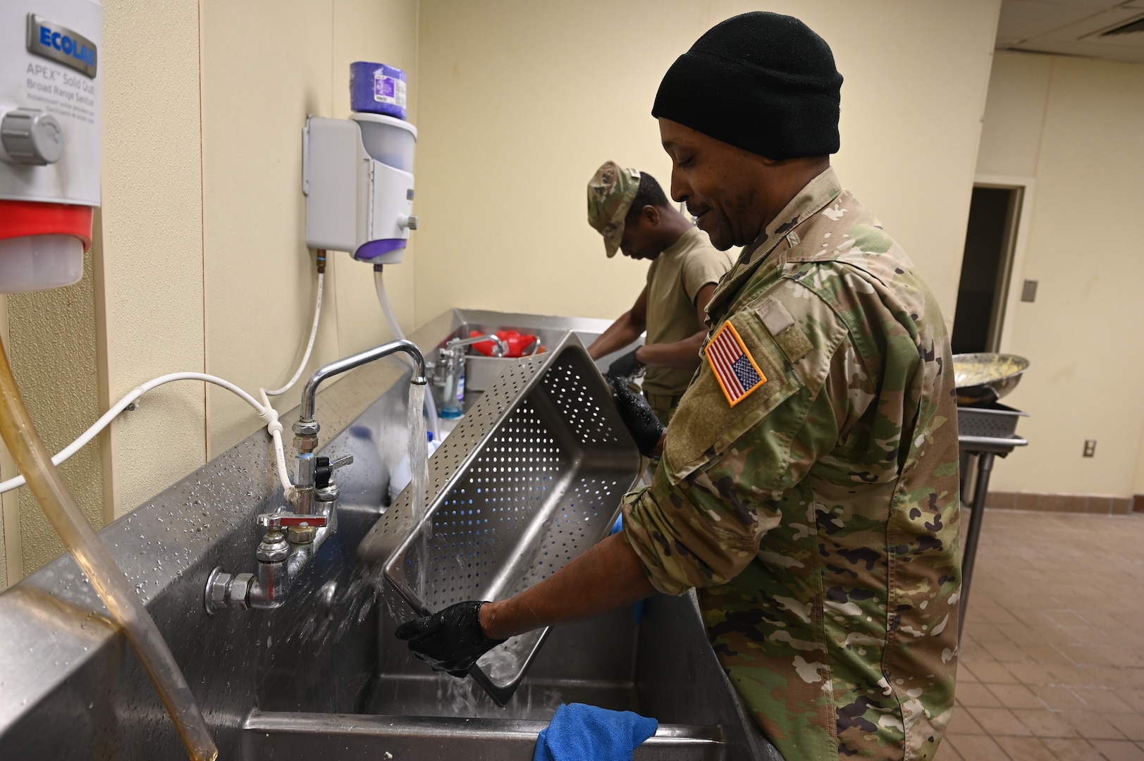Culinary specialists within the 642nd Quartermaster Detachment, District of Columbia National Guard, wash dishes following lunch at Joint Base Anacostia-Bolling, Feb. 3, 2024.  March marks National Nutrition Month, a time when individuals across the nation are encouraged to focus on making more informed food choices and developing healthier eating and physical activity habits.