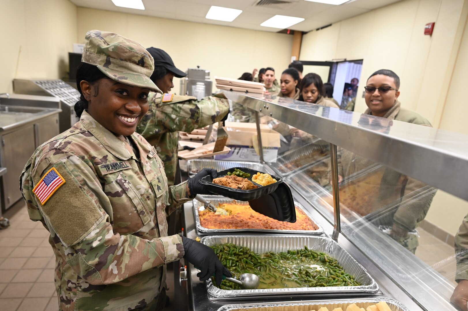 U.S. Army Sgt. Chanel Trammell, culinary specialist, 642nd Quartermaster Detachment, District of Columbia National Guard, serves lunch to members at Joint Base Anacostia-Bolling, Feb. 3, 2024.  March marks National Nutrition Month, a time when individuals across the nation are encouraged to focus on making more informed food choices and developing healthier eating and physical activity habits.