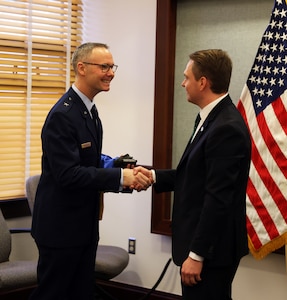 Brig. Gen. Kenneth Borchers, left, director of the Joint Staff, Washington National Guard, shakes hands with Ruslan Kravchenko, head of the Kyiv Regional State Administration, during a visit to Camp Murray, Wash., March 15, 2024. The visit to Camp Murray focused on sharing stories and building on friendship established during the 81st Stryker Brigade Combat Team’s 2021 deployment to Ukraine supporting the Joint Multinational Training Group - Ukraine mission.