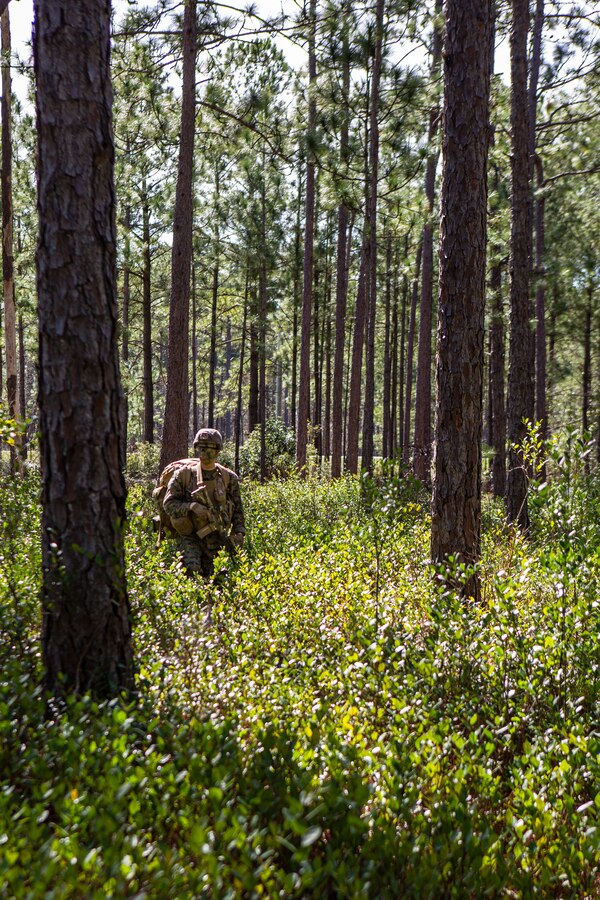 U.S. Marine Corps Pfc. Sean Aleksiewicz, a grenadier with 4th Light Armored Reconnaissance Battalion, 4th Marine Division (MARDIV), Marine Forces Reserve, pauses during a patrol as part of the 4th MARDIV Rifle Squad Competition on Marine Corps Base (MCB) Camp Lejeune, North Carolina, March 8, 2024. The three-day event tested the Marines across a variety of infantry skills to determine the most combat effective rifle squad within the 4th MARDIV. MCB Camp Lejeune training facilities allow warfighters to be ready today and prepare for tomorrow’s fight. (U.S. Marine Corps Photo by Lance Cpl. Daniela Chicas Torres)