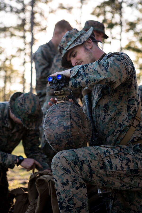 U.S. Marine Corps Sgt. Noah Swiney, a squad leader with 4th Light Armored Reconnaissance Battalion, 4th Marine Division (MARDIV), Marine Forces Reserve, mounts AN/PVS-31A night vision goggles as part of the 4th MARDIV Rifle Squad Competition on Marine Corps Base (MCB) Camp Lejeune, North Carolina, March 10, 2024. The three-day event tested the Marines across a variety of infantry skills to determine the most combat effective rifle squad within the 4th MARDIV. MCB Camp Lejeune training facilities allow warfighters to be ready today and prepare for tomorrow’s fight. (U.S. Marine Corps Photo by Lance Cpl. Daniela Chicas Torres)