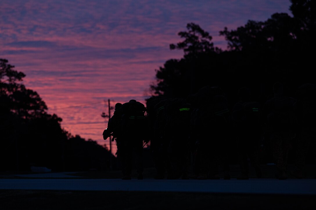 U.S. Marines with 4th Marine Division (MARDIV), Marine Forces Reserve, conduct a timed movement during the 4th MARDIV Rifle Squad Competition on Marine Corps Base (MCB) Camp Lejeune, North Carolina, March 8, 2024. The three-day event tested the Marines across a variety of infantry skills to determine the most combat effective rifle squad within the 4th MARDIV. MCB Camp Lejeune training facilities allow warfighters to be ready today and prepare for tomorrow’s fight. (U.S. Marine Corps Photo by Cpl. Antonino Mazzamuto)