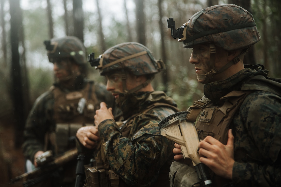 U.S. Marine Corps Cpl. Michael Tyer, a team leader with 1st Battalion, 25th Marine Regiment, 4th Marine Division (MARDIV), Marine Forces Reserve, awaits instructions during the 4th MARDIV Rifle Squad Competition on Marine Corps Base (MCB) Camp Lejeune, North Carolina, March 9, 2024. The three-day event tested the Marines across a variety of infantry skills to determine the most combat effective rifle squad within the 4th MARDIV. MCB Camp Lejeune training facilities allow warfighters to be ready today and prepare for tomorrow’s fight. (U.S. Marine Corps Photo by Cpl. Jorge Borjas)
