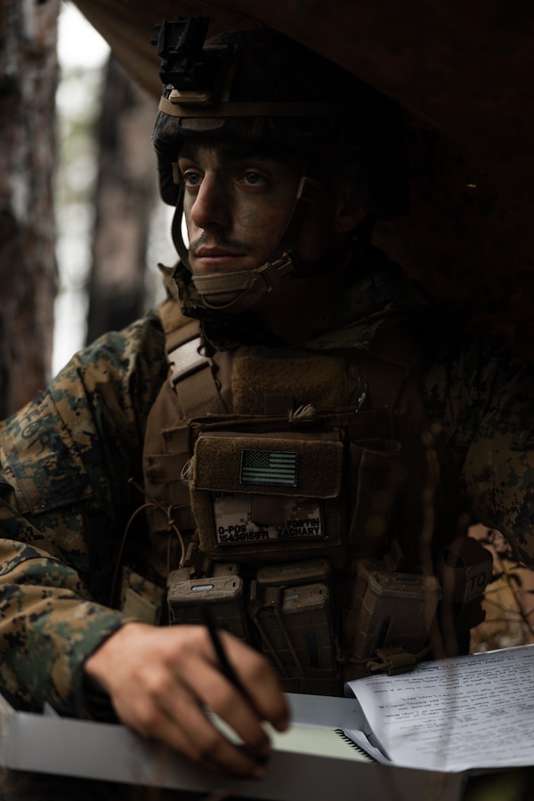 U.S. Marine Corps Lance Cpl. Zachary Fortin, a squad leader with 1st Battalion, 25th Marine Regiment, 4th Marine Division (MARDIV), Marine Forces Reserve, prepares for the next evaluated event during the 4th MARDIV Rifle Squad Competition on Marine Corps Base (MCB) Camp Lejeune, North Carolina, March 9, 2024. The three-day event tested the Marines across a variety of infantry skills to determine the most combat effective rifle squad within the 4th MARDIV. MCB Camp Lejeune training facilities allow warfighters to be ready today and prepare for tomorrow’s fight. (U.S. Marine Corps Photo by Cpl. Jorge Borjas)