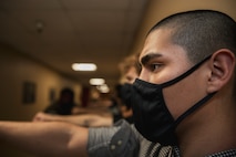 U.S. Marine Corps Recruit Christian Rodriguez with Lima Company, 3rd Recruit Training Battalion, waits in line to be sized for clothing issue during receiving at Marine Corps Recruit Depot San Diego, California, March 11, 2024. During the receiving process drill instructors are responsible for ensuring recruits are checked for contraband, given haircuts, make a phone call home, and are issued the gear necessary for training. (U.S. Marine Corps photo by Sgt. Yvonna Guyette)
