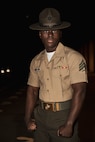 U.S. Marine Corps Sgt. Sharif Adan, a drill instructor with Receiving Company, Support Training Battalion, poses for a portrait before receiving recruits at Marine Corps Recruit Depot San Diego, California, March 11, 2024. During the receiving process drill instructors are responsible for ensuring recruits are checked for contraband, given haircuts, make a phone call home, and are issued the gear necessary for training. (U.S. Marine Corps photo by Sgt. Yvonna Guyette)
