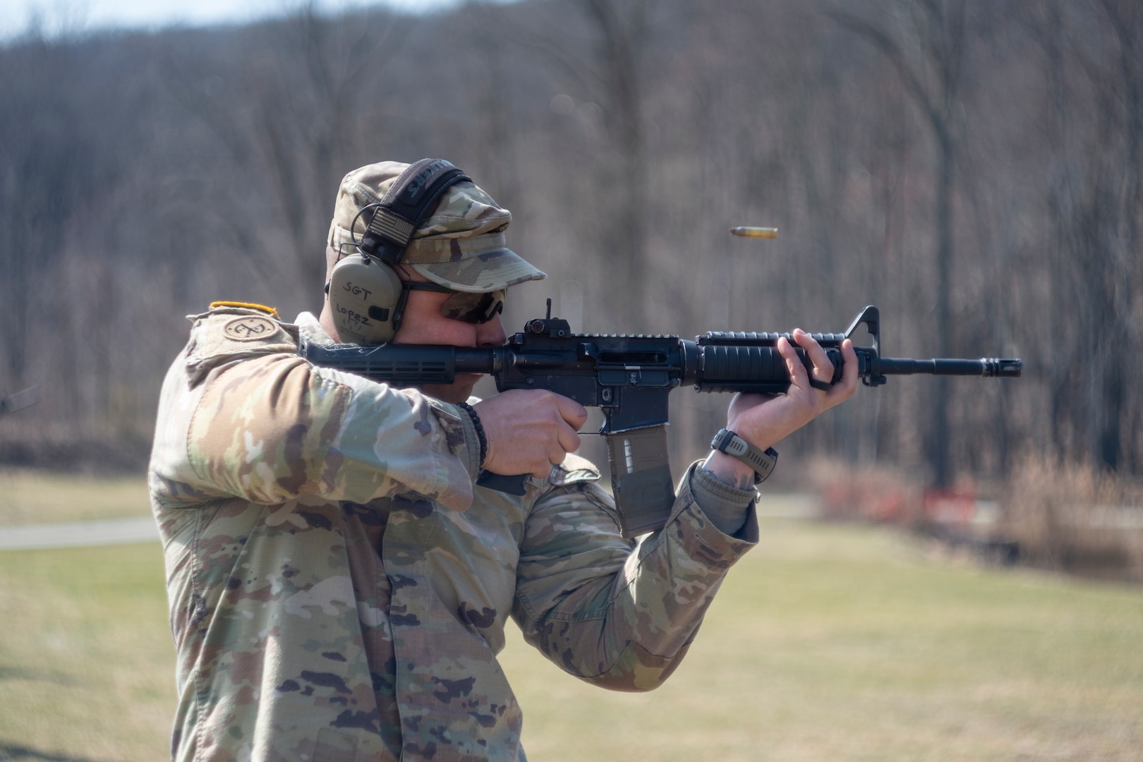 U.S. Army Sgt. Miguel Lopez, a team leader assigned to Alpha Company, 1st Battalion, 69th Infantry Regiment, fires an M4 carbine at Camp Smith Training Site in Peekskill, New York, during the 2024 Logan-Duffy Marksmanship Competition March 13, 2024. The competition, first held in 1936, is an annual shooting match between the 1st Battalion, 69th Infantry Regiment, and the 1st Battalion, 182nd Infantry Regiment.