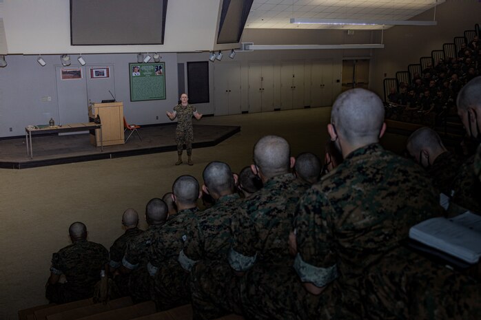U.S. Marine Corps Sgt. Triston Taylor, a drill instructor with Support Battalion, Recruit Training Regiment, instructs recruits with Fox Company, 2nd Recruit Training Battalion, during the first of three casualty care classes held at Marine Corps Recruit Depot San Diego, California, March 14, 2024. Recruits receive three different periods of instruction on casualty care and the importance of ensuring the appropriate medical care is given at the correct time and place when necessary. (U.S. Marine Corps photo by Sgt. Jesse K. Carter-Powell)