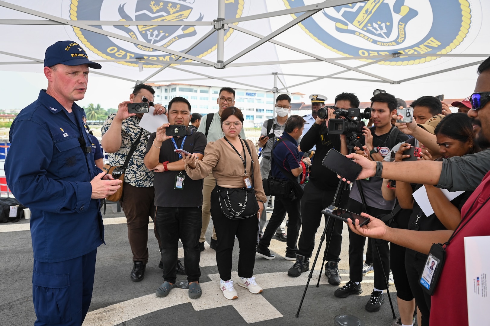 Capt. Billy Mees, commanding officer of U.S. Coast Guard Cutter Bertholf (WMSL 750), speaks to Malaysian media after the cutter arrived in Port Klang, Malaysia, March 1, 2024. The media engagement allowed the local press to come aboard Bertholf and cover the first U.S. Coast Guard ship to moor in Port Klang. (U.S. Coast Guard photo by Petty Officer Steve Strohmaier)