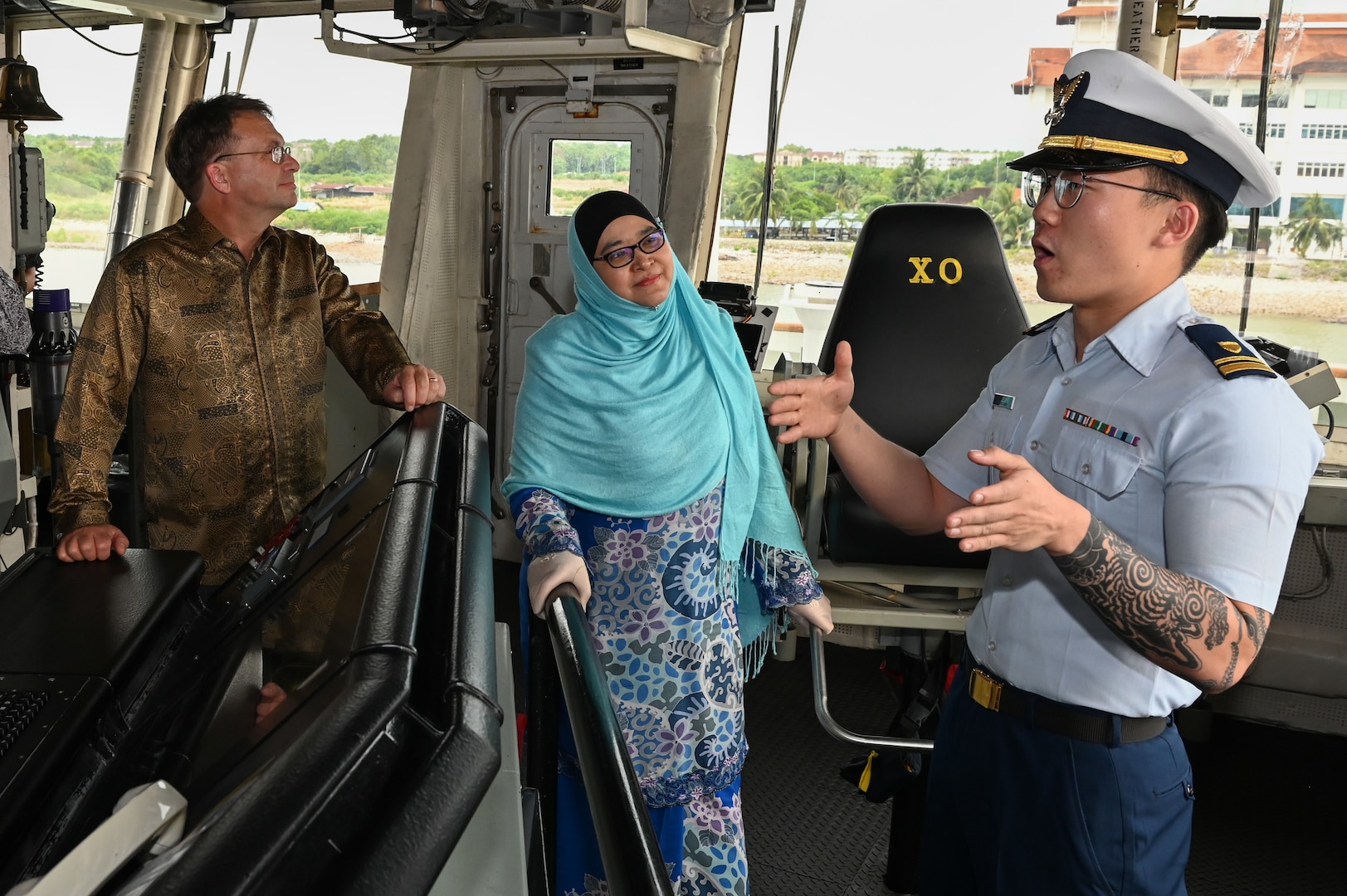Lt. j.g. Mathew Cho speaks to YBhg. Dato’ Anis Rizana Binti Mohd Zainudin, Director General of Royal Malaysian Customs, and Edgard D. Kagan, U.S. Ambassador-designate to Malaysia, during a tour aboard U.S. Coast Guard Cutter Bertholf (WMSL 750) while the cutter was moored in Port Klang, Malaysia, March 2, 2024. This was the first time a U.S. Coast Guard vessel has moored in Port Klang. (U.S. Coast Guard photo by Petty Officer Steve Strohmaier)