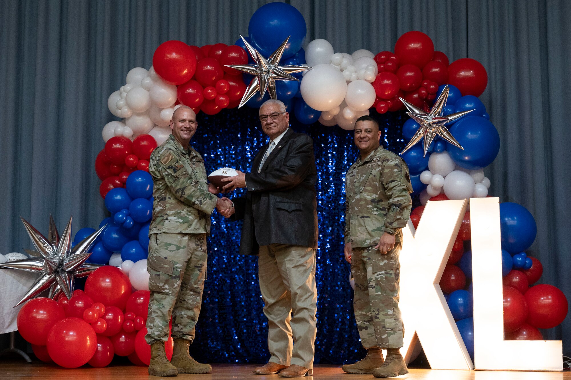 Award winners received footballs as representation of the support and dedication from Laughlin’s civic leaders to help Laughlin’s mission make it to the “end zone” every year. (U.S. Air Force photo by Senior Airman Kailee Reynolds)