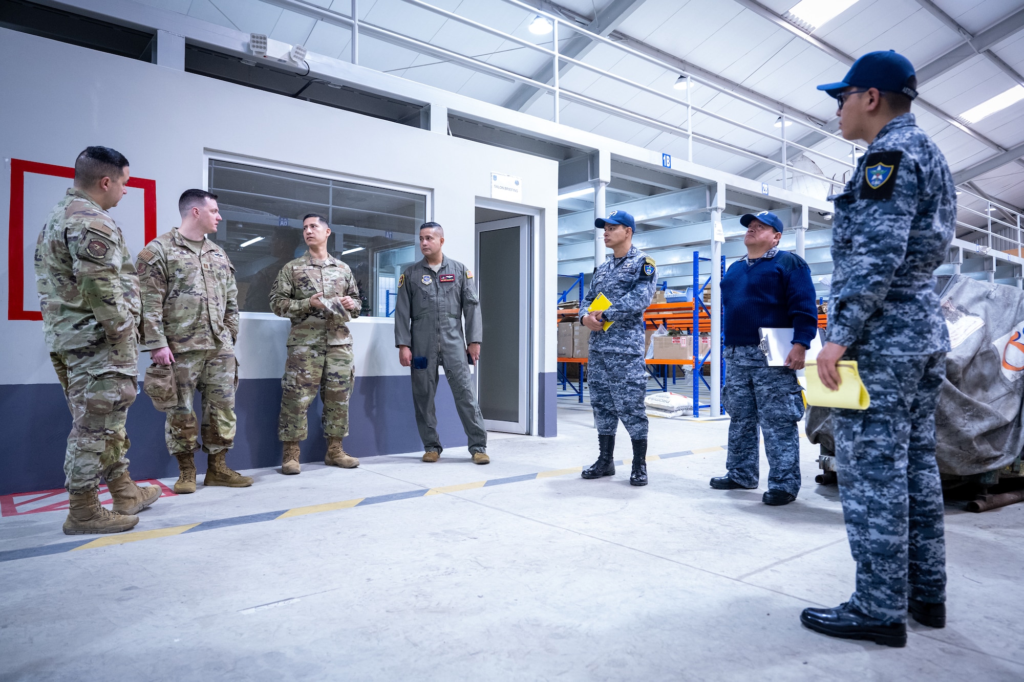 Military service members with the 571st Mobility Support Advisory Squadron and Comando Aéreo Central (CACEN) spoke about similarities and differences between the two Air Force units during a base tour at CACEN “La Aurora” in Guatemala City, Guatemala, Feb. 23, 2024.